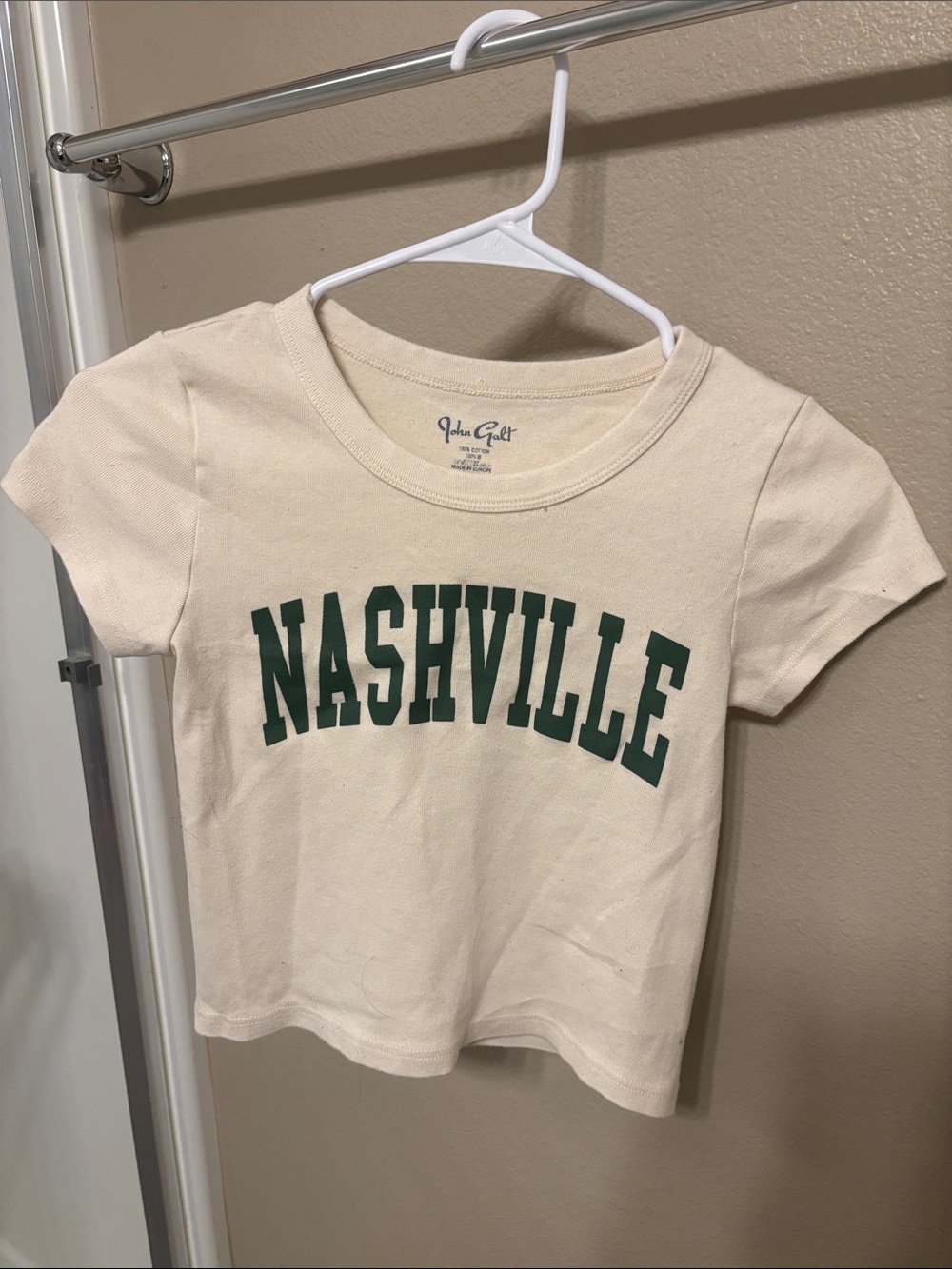 Brandy Melville Cream Short Sleeve Tee with Green "NASHVILLE" Print